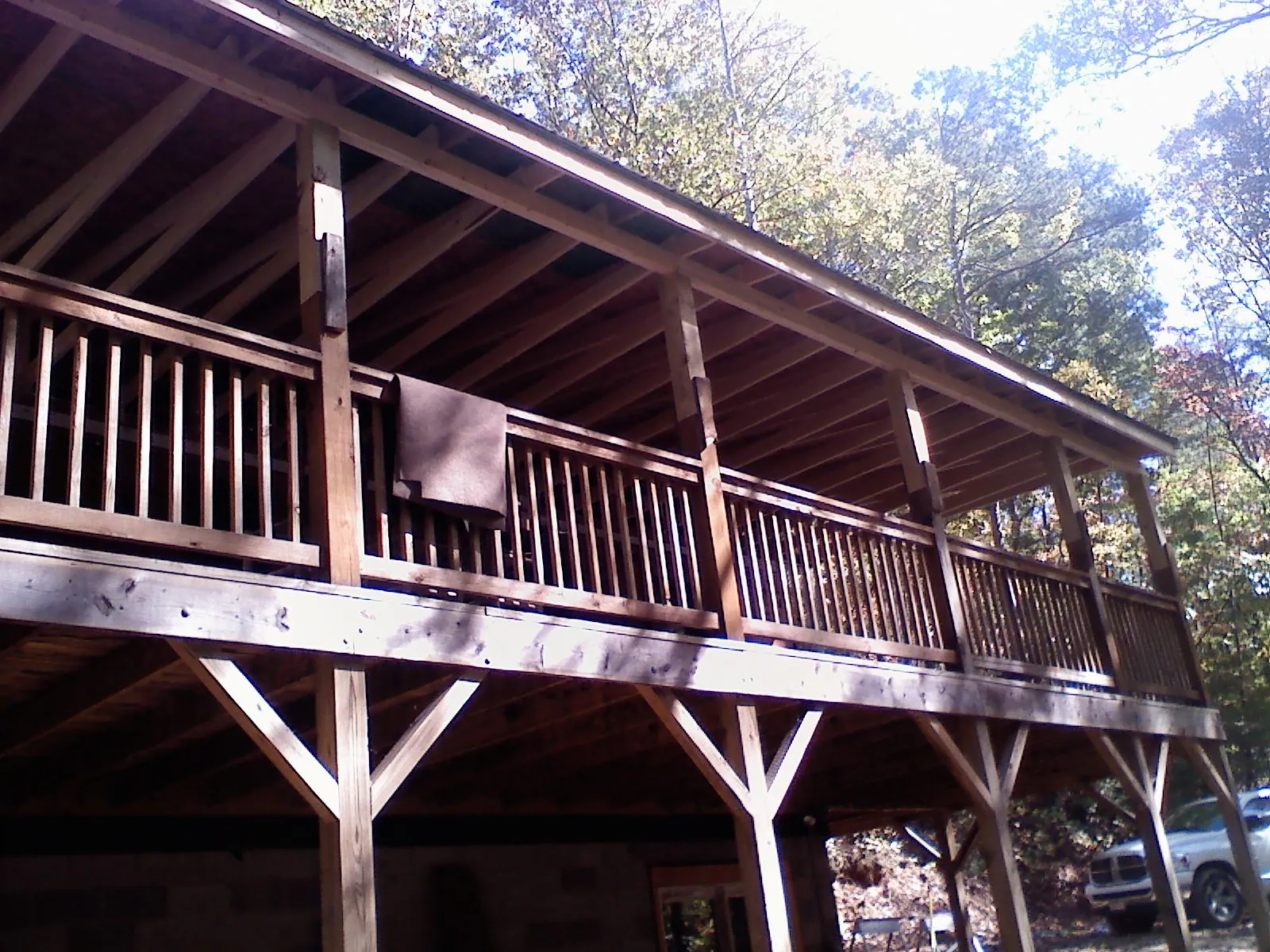 Timber framing under a new elevated porch and deck — Roof Leak Repair in Lempster by Roofing Brothers
